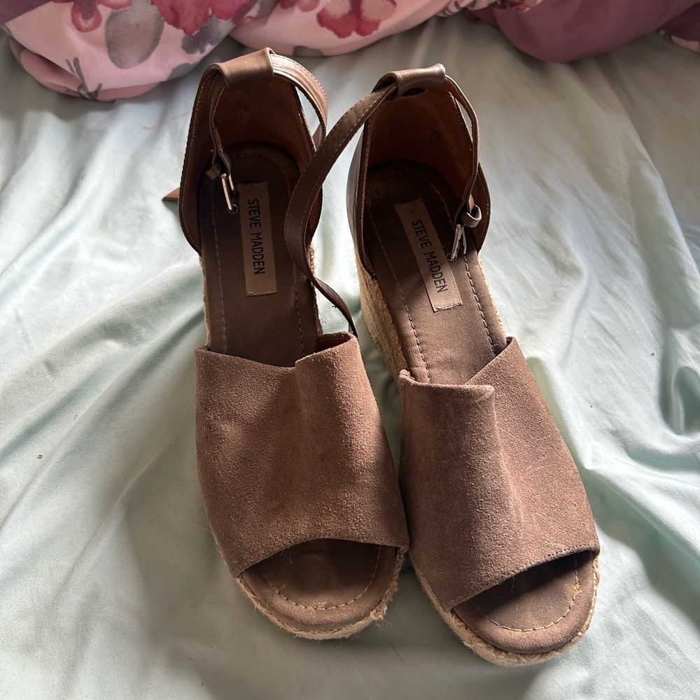 Very worn women’s sandals